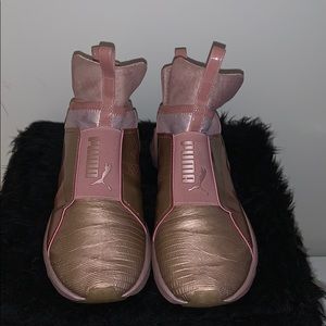 Kylie Jenner rose gold pumas